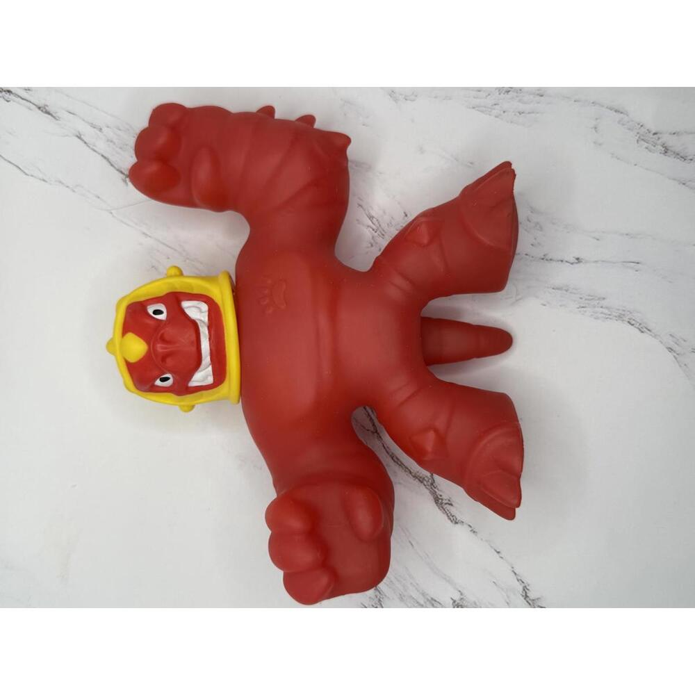 Red Monster Action Figure with Yellow Helmet